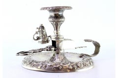 Silver paddle with embossed scissors