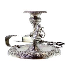 Silver paddle with embossed scissors