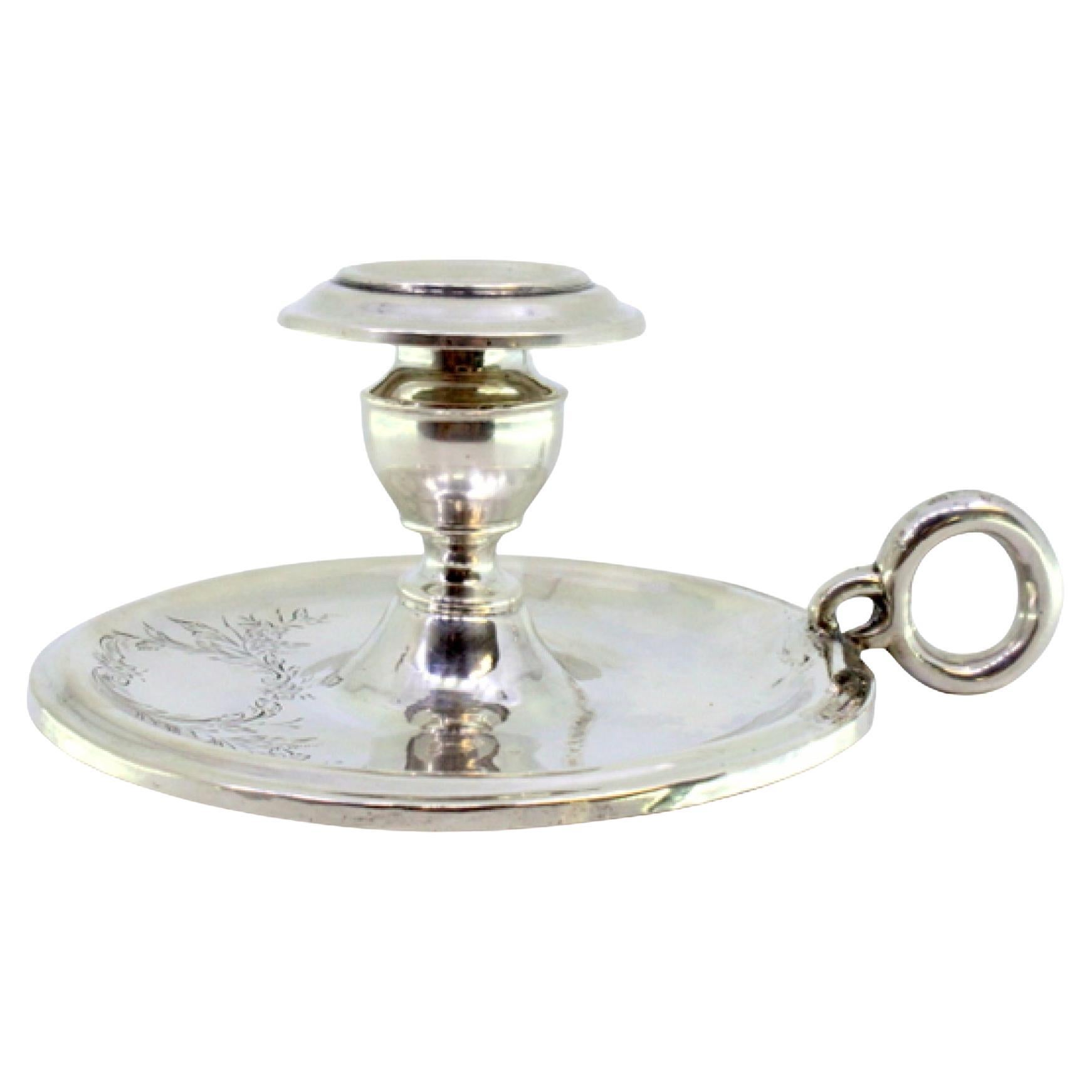 Silver paddle with engraved plant motifs surrounding a monogram card For Sale