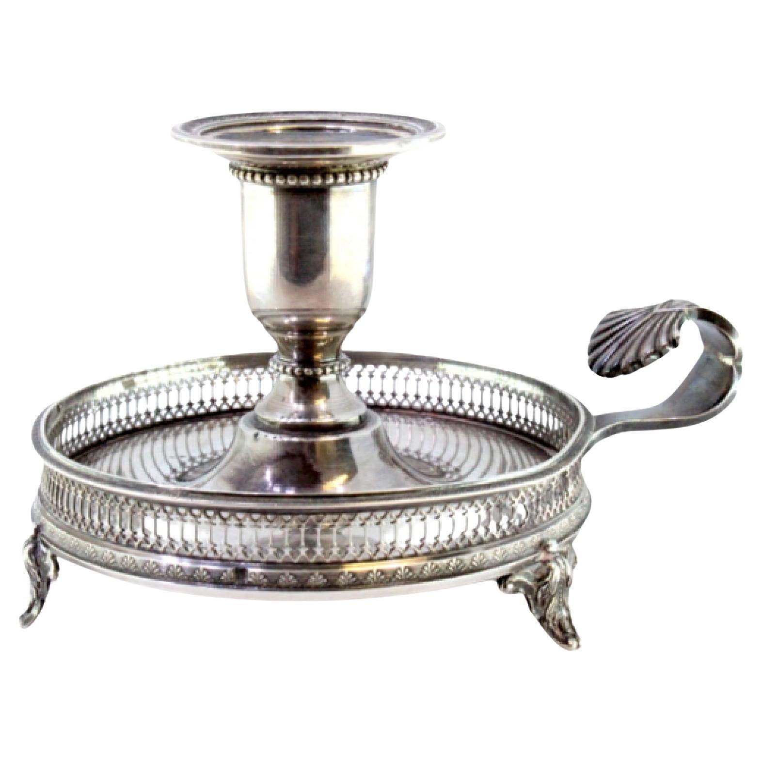 Silver paddle with grate and borders on the edge