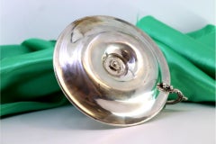 Silver paddle with guilloche reliefs and applications on the handle