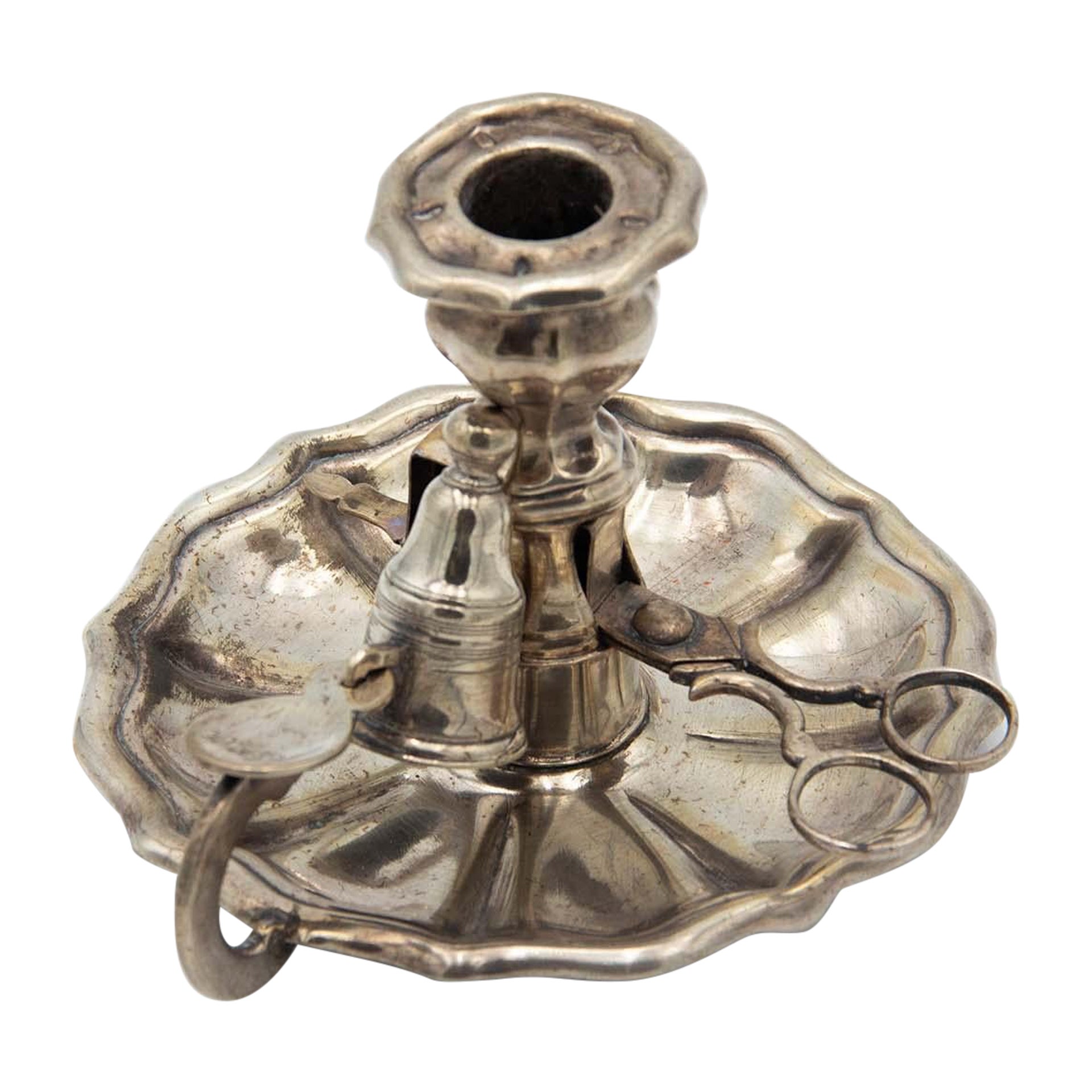 Silver paddle with morrón scissors and eraser