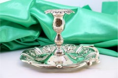 Silver paddle with reliefs and acanthus leaves