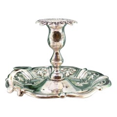 Silver paddle with reliefs and acanthus leaves