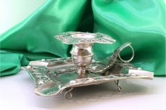 Silver paddle with reliefs