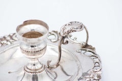 Silver paddle with reliefs