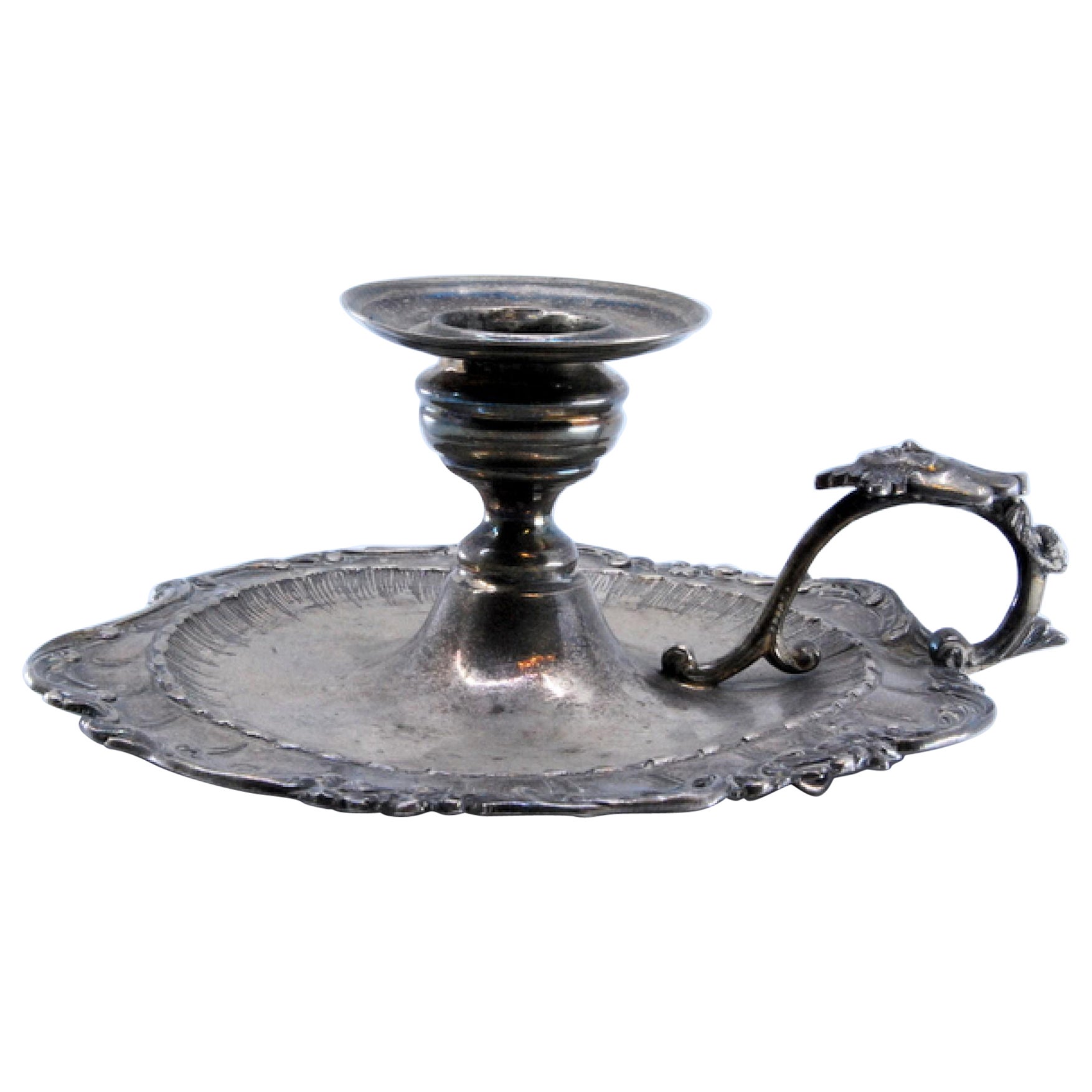 Silver paddle with shell shape and harlequin on the handle