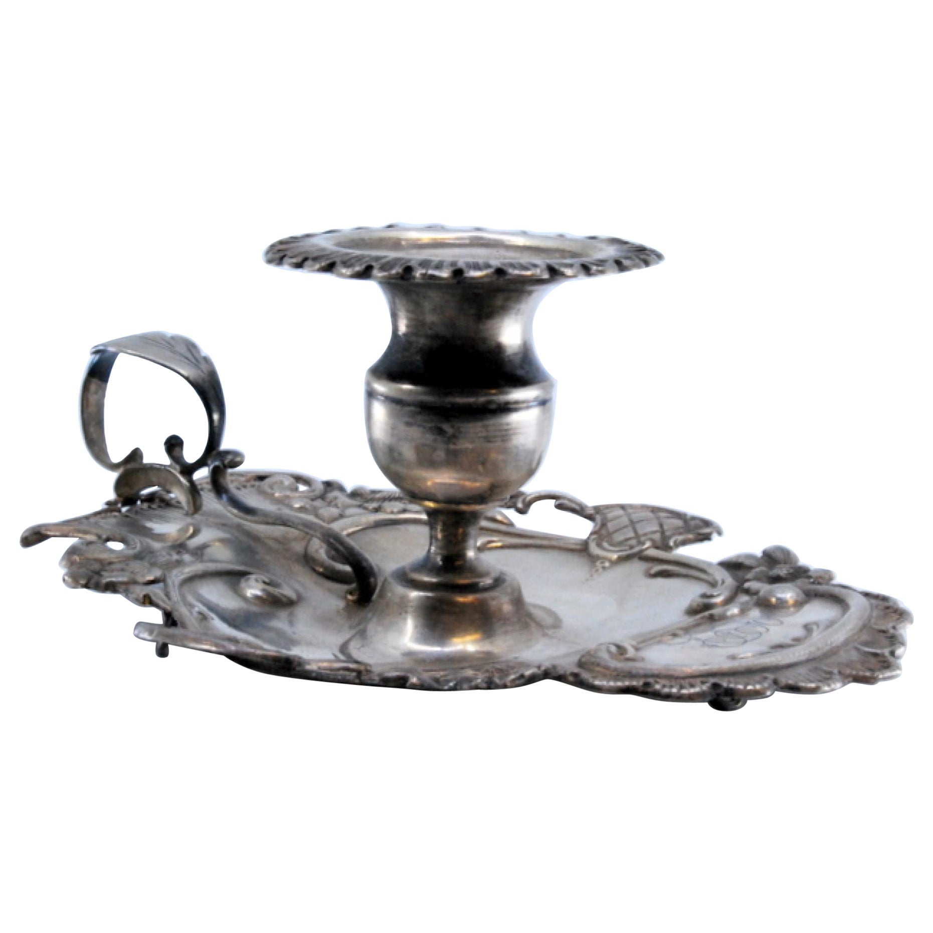 Silver paddle with shells and floral motifs