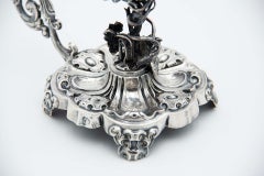 Silver paddle with vine reliefs