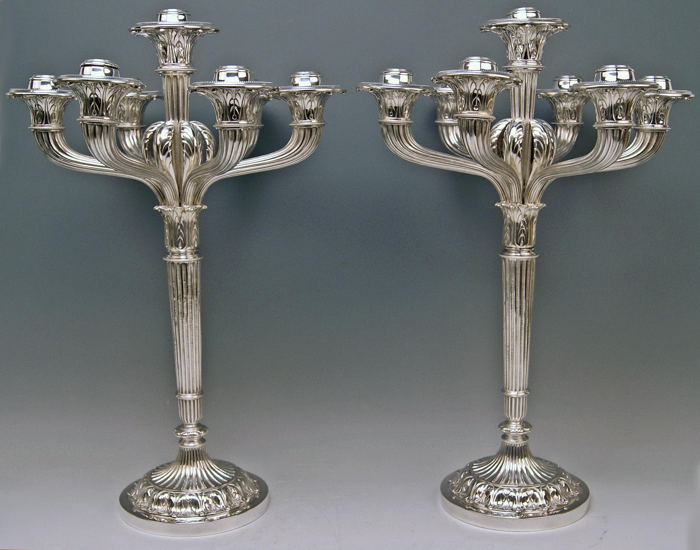 Silver huge pair of candlesticks, made by Bruckmann & Sons (Germany / Heilbronn).

Historicism Period (made circa 1882 - 85)
Hallmarked SILVER '800'
Manufactory: 
Marked by Eagle Sign of Bruckmann & Soehne (= SONS), Heilbronn (Germany) /