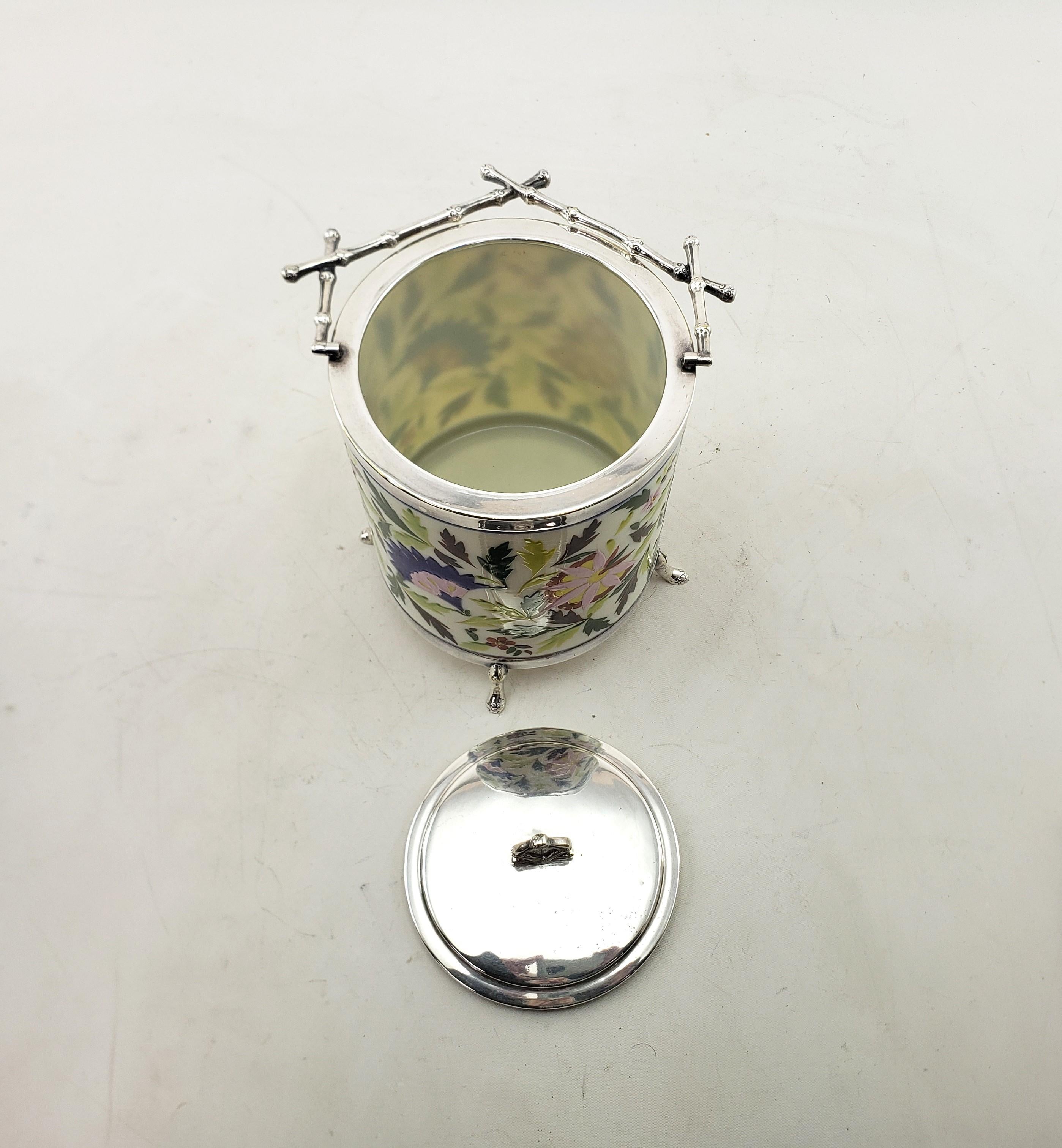 20th Century  Silver Plated & Ceramic Biscuit Barrel with Floral Decoration & Twig Handle For Sale