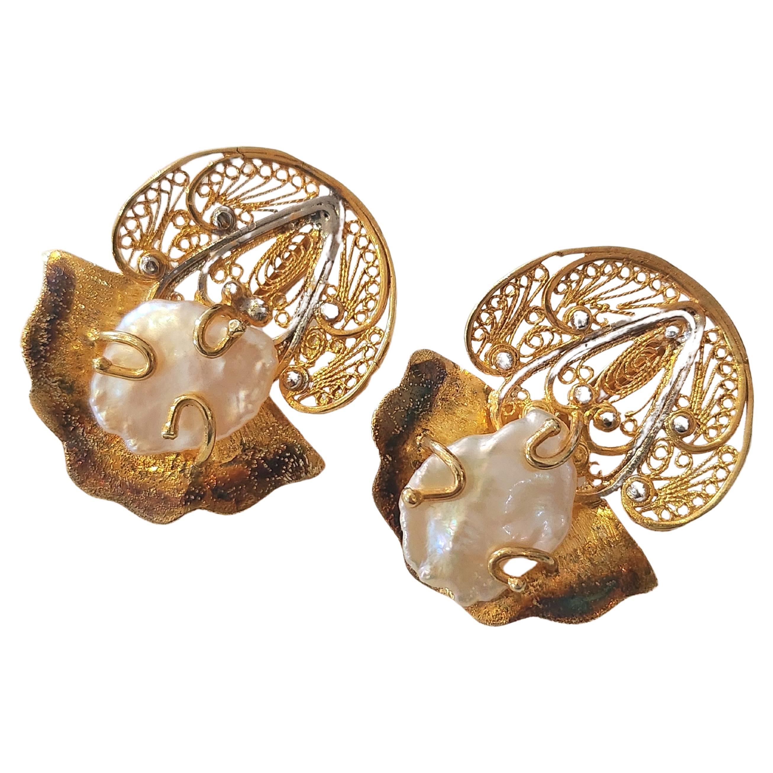 Contemporary large hand made silver earrings 925 gold plated with 750k gold in byzantine open work style centered with nutaral pearls decorated with enamel with total earrings weight 16 grams 