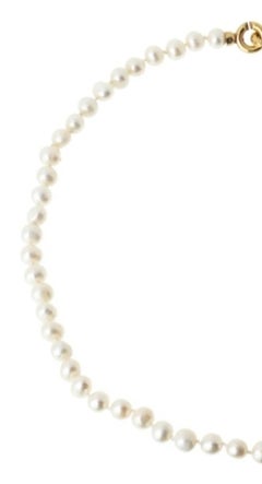 Silver - Pearl necklace with 19.2K Gold clasp.