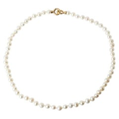 Silver - Pearl necklace with 19.2K Gold clasp.
