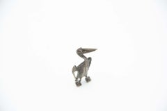 Silver pelican miniature