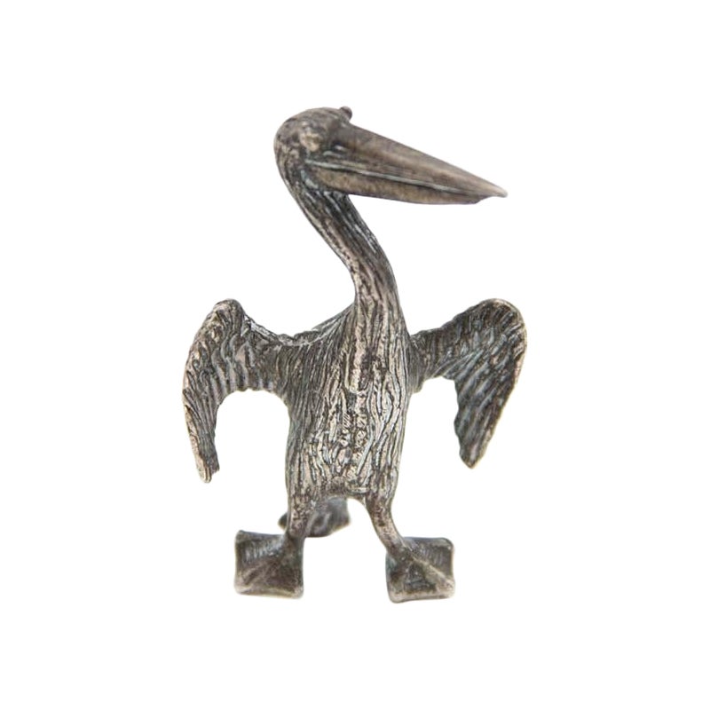 Silver pelican miniature