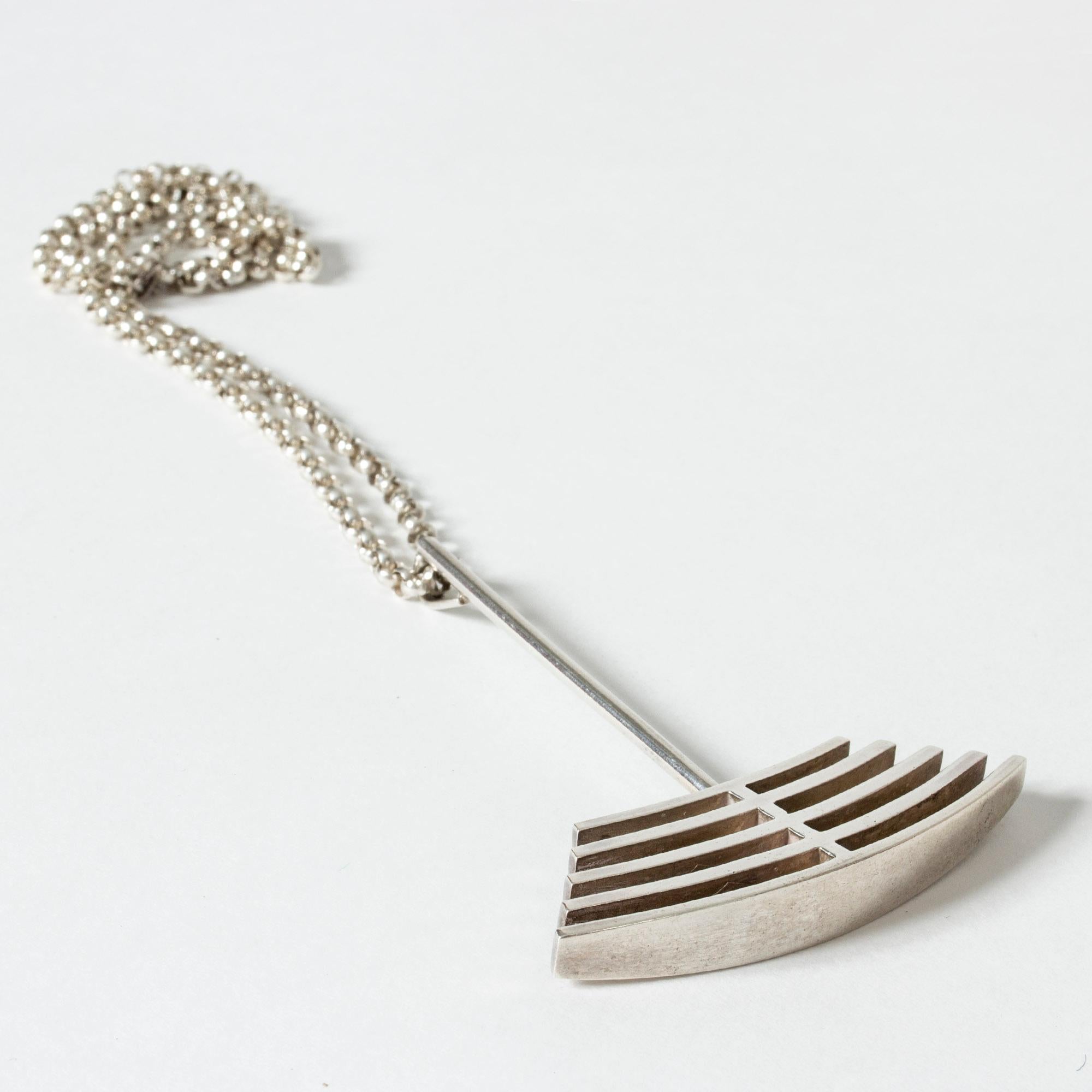 Striking silver pendant by Arne Johansen, in a graphic anchor like design. Heavy silver quality.