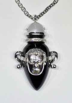 A Silver Greek Amphora Pendant set with Moonstone, Onyx & Diamond