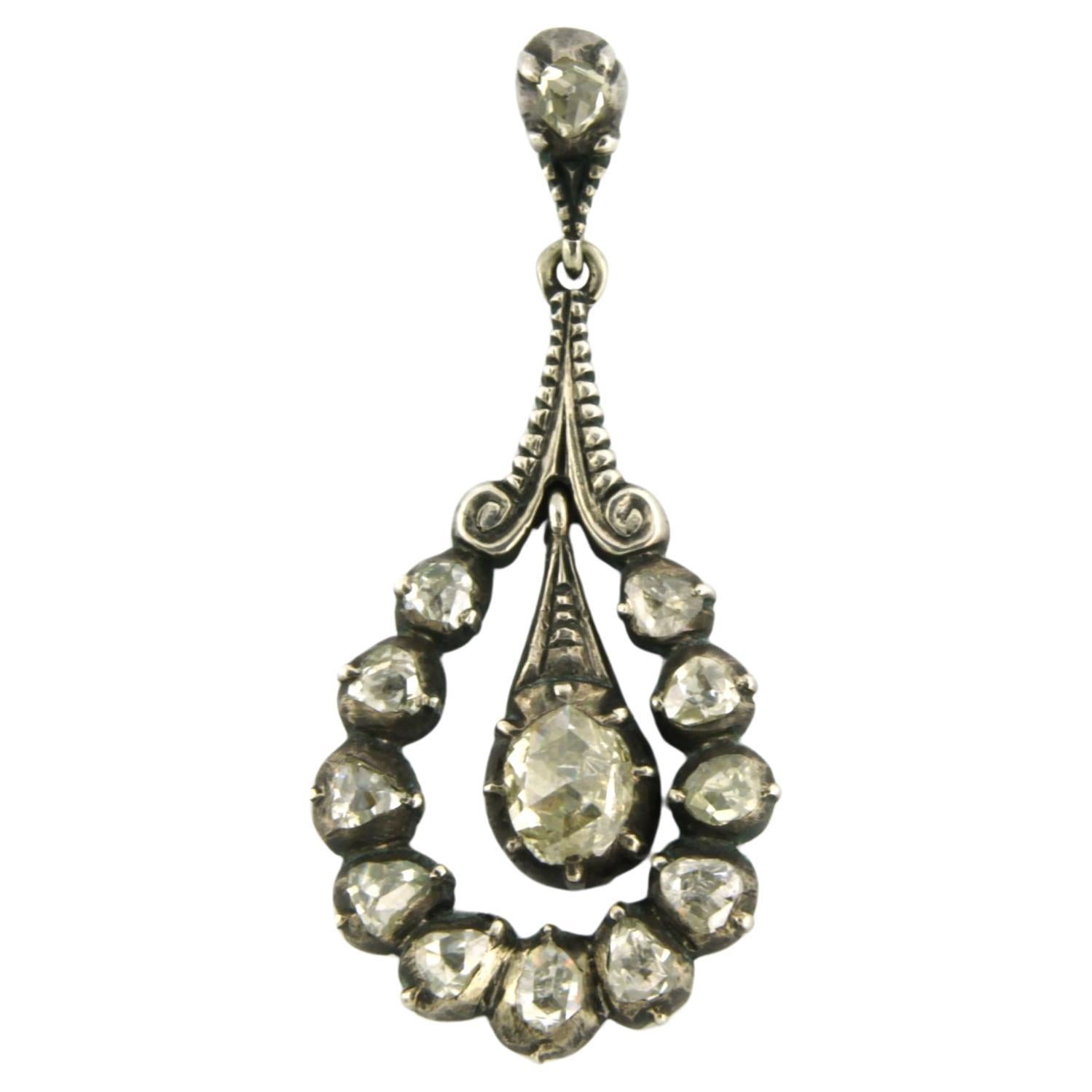 Silver pendant set with rose cut diamonds. 1.80ct – G/H – SI