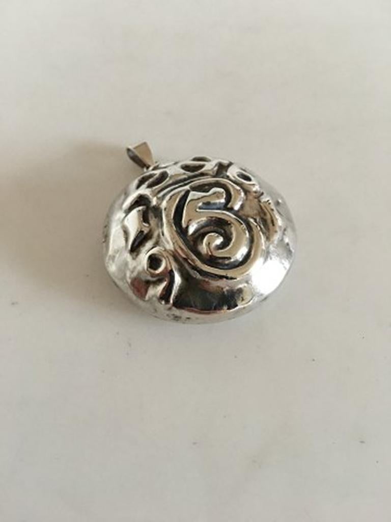 Silver Pendant with a Monogram from King Christian 5 of Denmark. Measures 4.5 cm dia / 1 49/64 in. Weighs 12 g / 0.40 oz. Made by silversmithy H. Andreasen around the 1950's from a model of Iron knobs originally placed on the gates of Kronborg