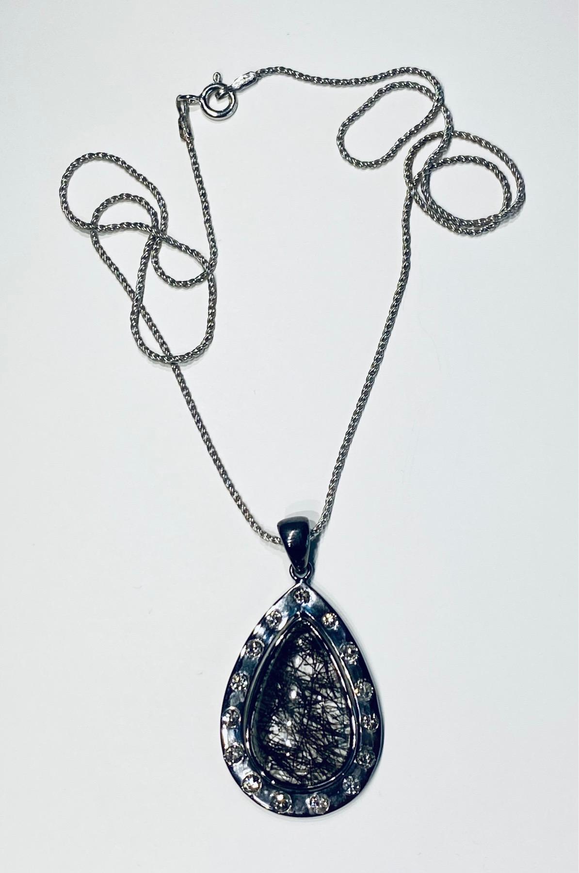 Kary Adam Designed, Blackened Silver Pendant with Grafetite Quartz surrounded by Diamonds on an 18