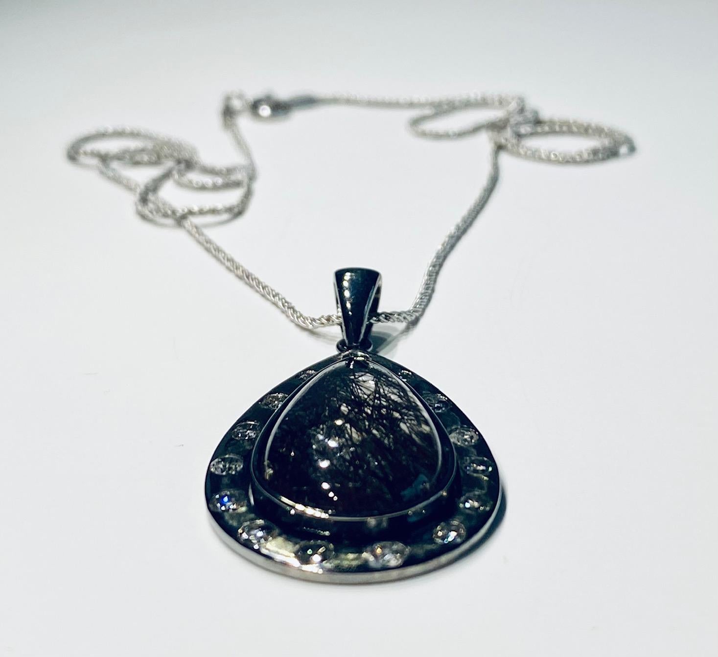 A Darkened Silver Pendant set with Diamonds,  around a Grafetite Quartz Cabochon In New Condition For Sale In Seattle, WA