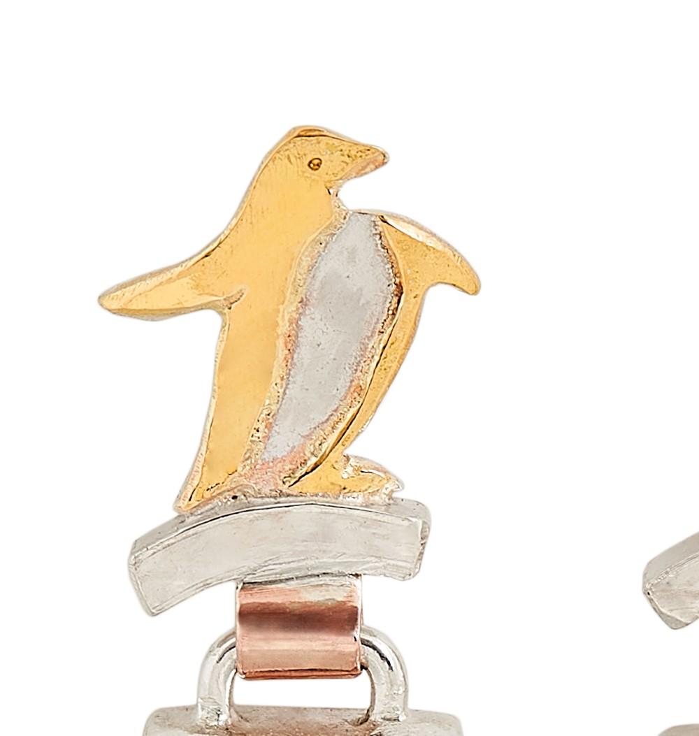 Silver Penguin Drop Earrings with 22 Karat Yellow Gold Detail In New Condition In Devon, GB