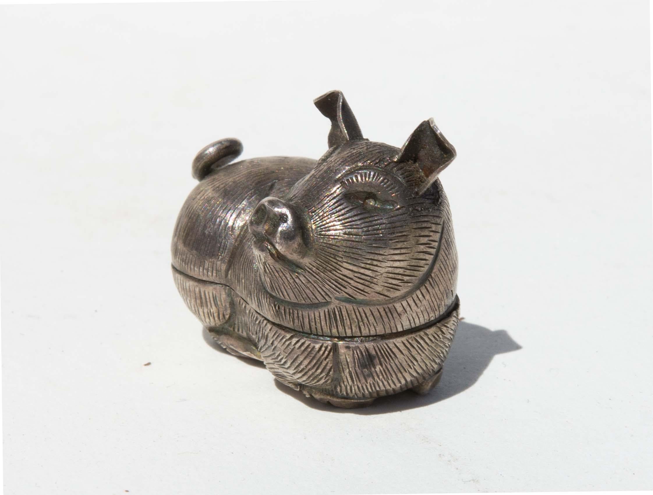 Silver pill box of resting pig, Chinese, early 20th century.