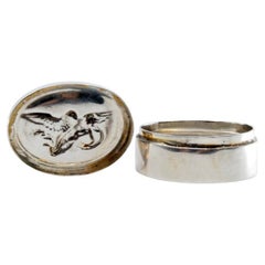 Silver pill box with embossed angel on the removable lid