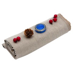 Silver pill box with enamel floral motifs, gold interior and hinged lid