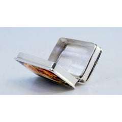 Silver pill box with enamel nude woman figure on the hinged lid