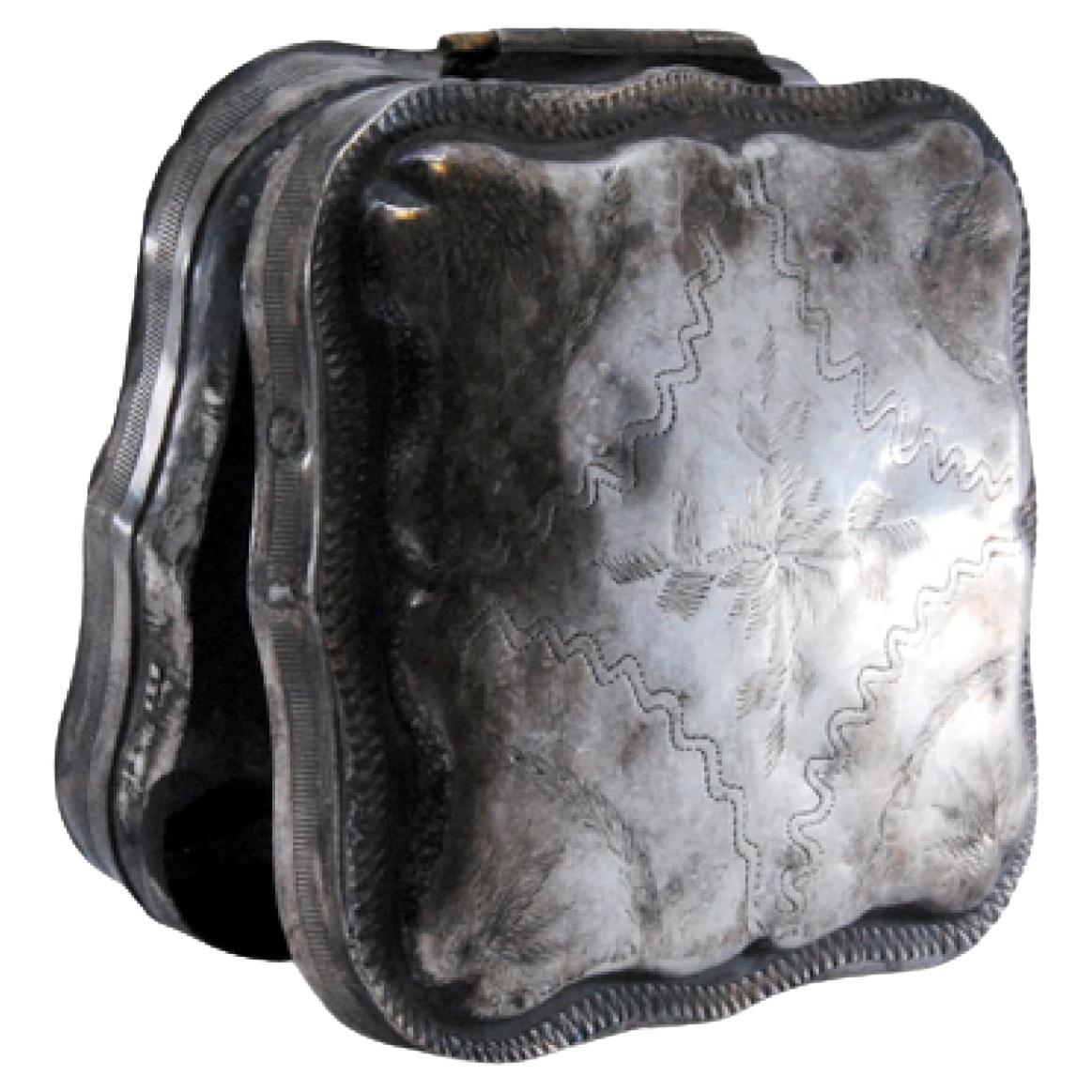 Silver pill box with engraved plant motifs and hinged lid