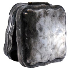 Silver pill box with engraved plant motifs and hinged lid