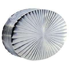 Silver pin box with vortex-shaped reliefs