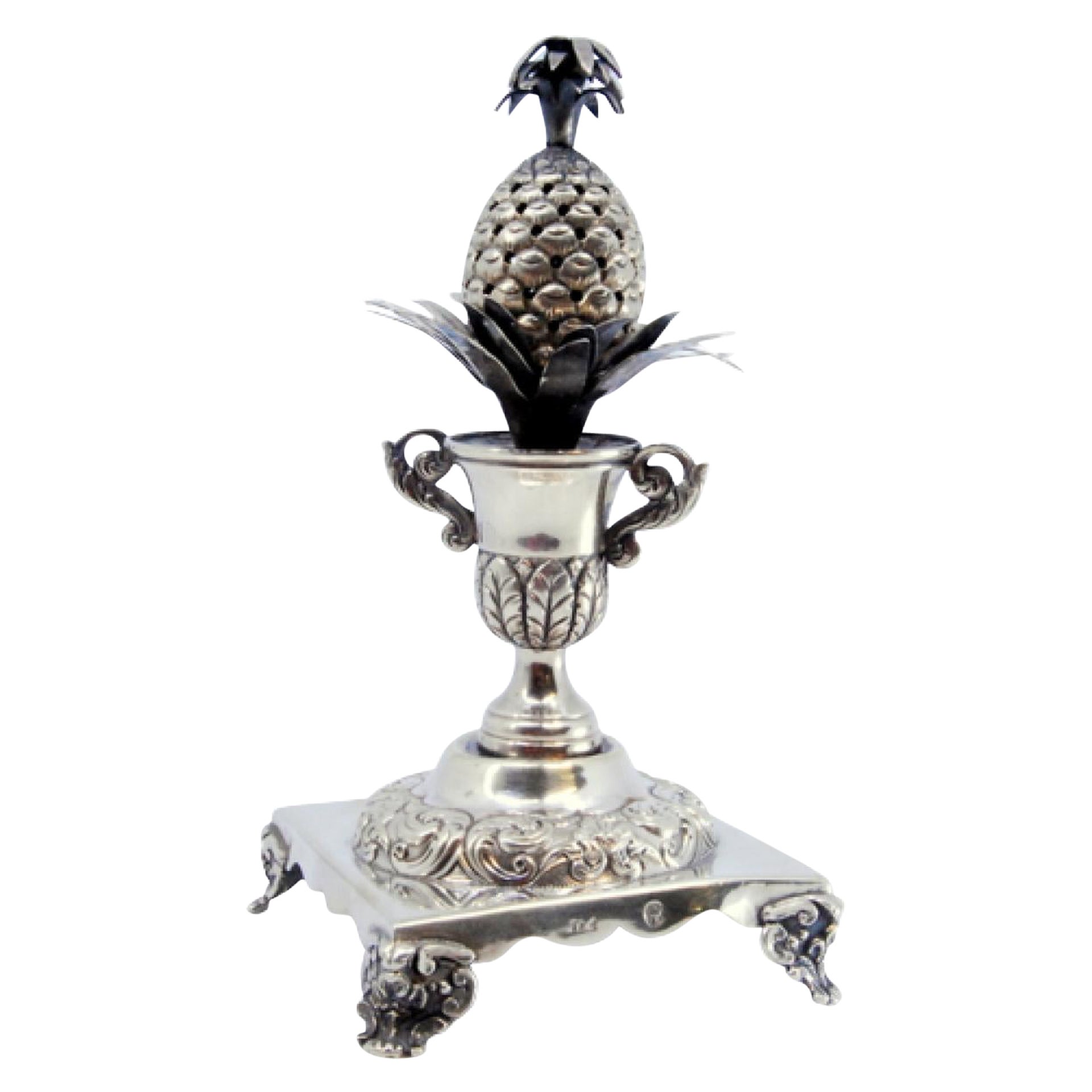 Silver pineapple-shaped toothpick holder on square base with four feet