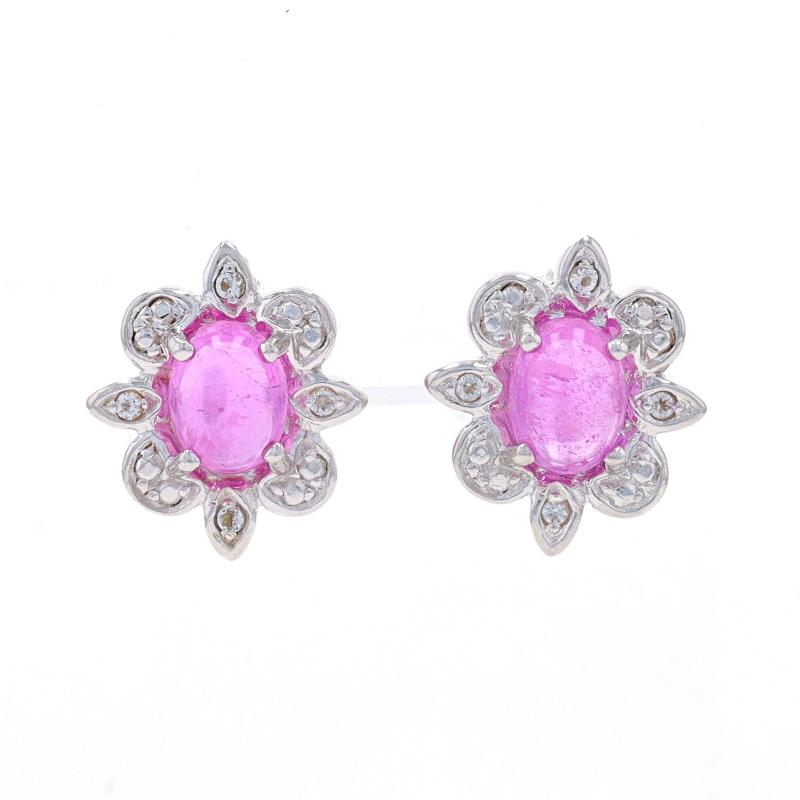 Metal Content: Sterling Silver

Stone Information

Natural Pink Tourmalines
Carat(s): 2.15ctw
Cut: Oval Cabochon

Natural White Topaz
Carat(s): .08ctw
Cut: Round

Total Carats: 2.23ctw

Style: Large Stud
Fastening Type: Butterfly Closures
Theme: