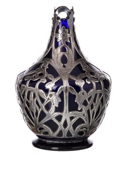 Silver - Pitcher and glass with silver accents