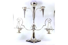 Silver planter with two suspended containers and cups, smooth body with cutouts