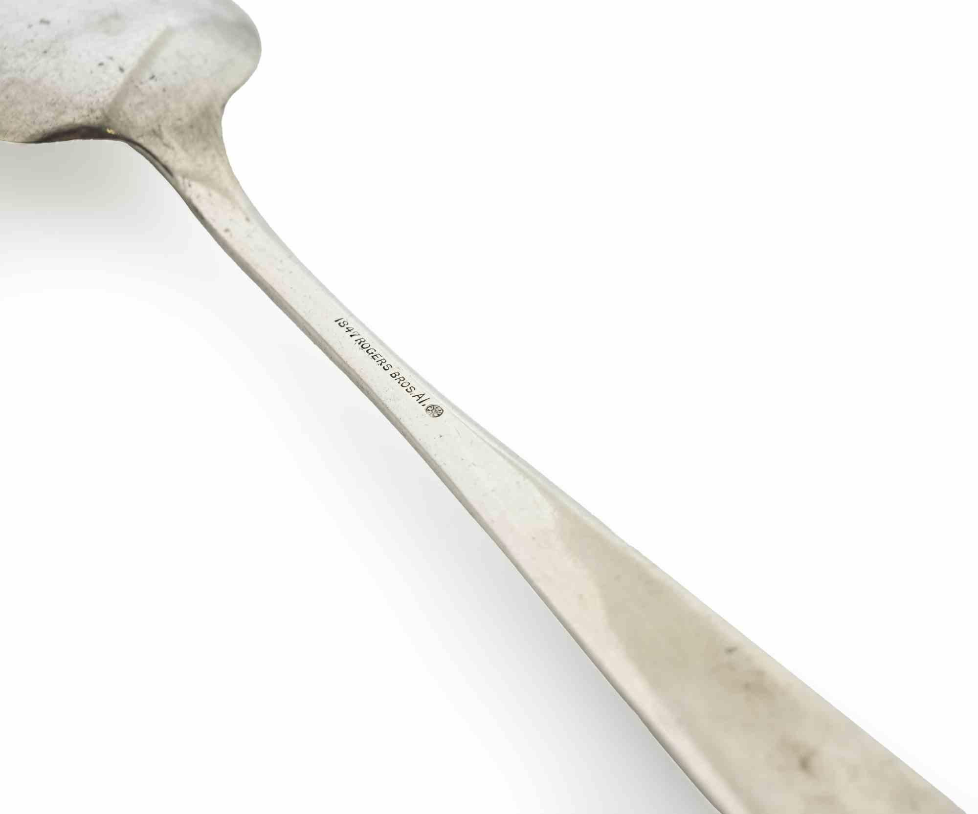 Silver Plate Spoon by Rogers Bros, realized in 1847. 

Very good estate condition, with moderate sign of use.