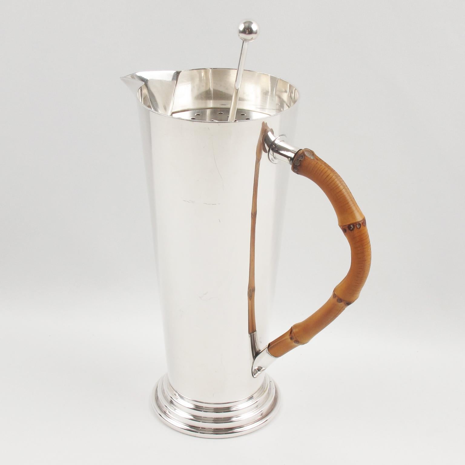 A streamline and Minimalist barware set designed by French silversmith Maison Deschamps Frères, Paris. Sleek and modernist design with extra tall silver plate Martini pitcher with extremely elegant real bamboo handle and long stirrer spoon. Marked