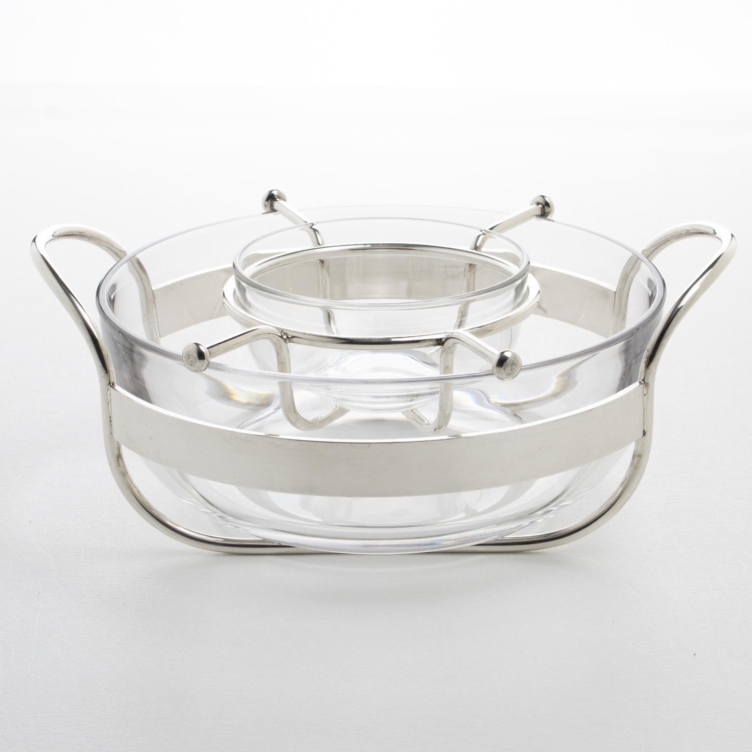 Italian silversmith company P.M. designed this luxury modernist silver plate and crystal caviar serving bowl, dish, or chiller in the 1980s. The minimalist chic design features a neat round shape with a substantial crystal container and silver plate