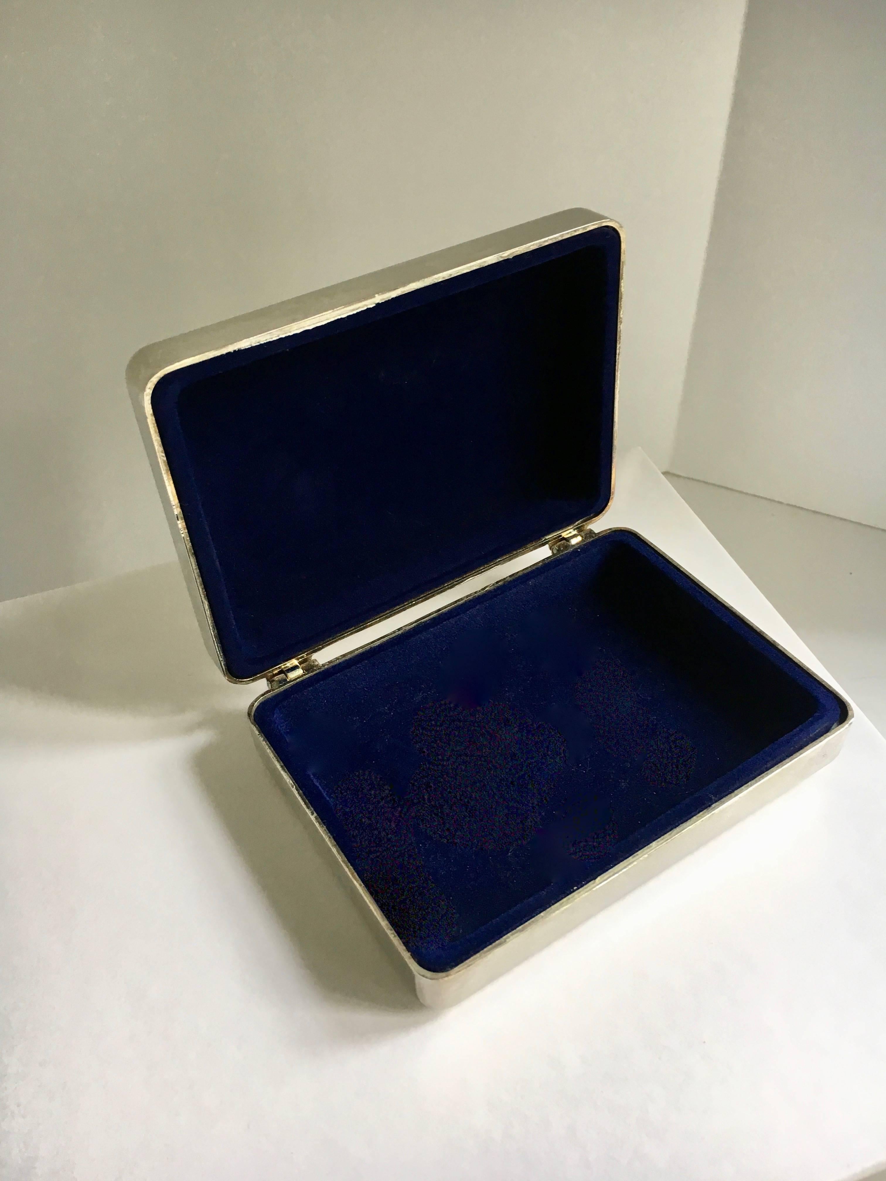 Silver plate box with blue interior a handsome box, perfect for storing everything from daily items, mementos, to Jewelry for home or travel - a lovely and sophisticated box for any room or dressing table.