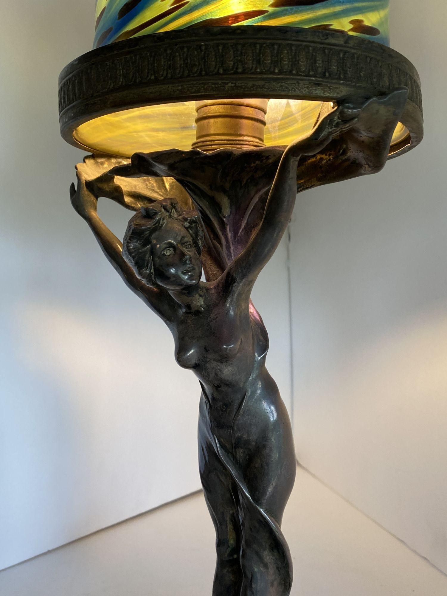 art nouveau lamp woman