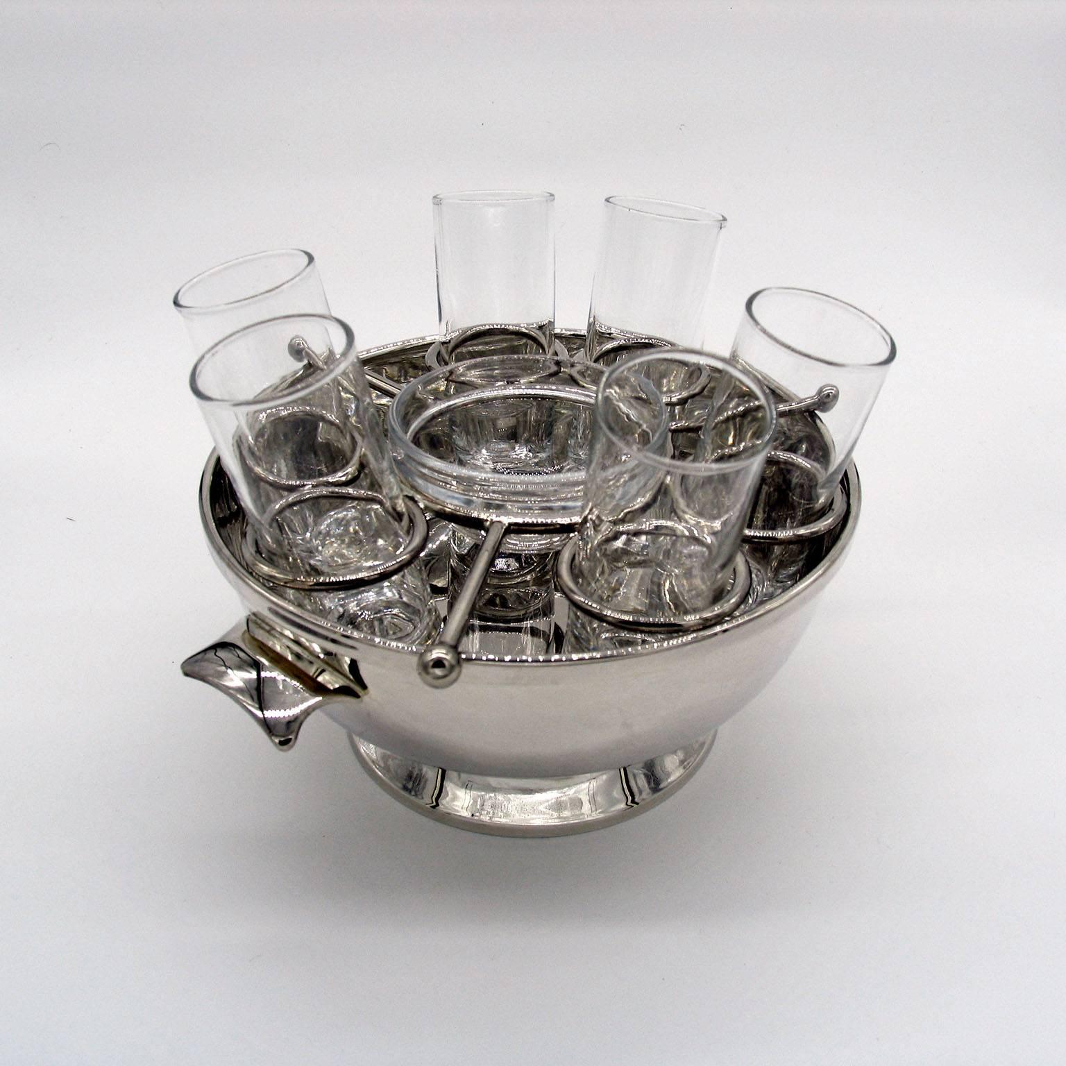 A beautiful, finely shaped Art Deco caviar and vodka silver plated server, comprising a bowl with six vodka glasses and a central glass bowl for caviar. The bowls interior allows you to fill it with crushed ice to keep the glasses and caviar chilled.