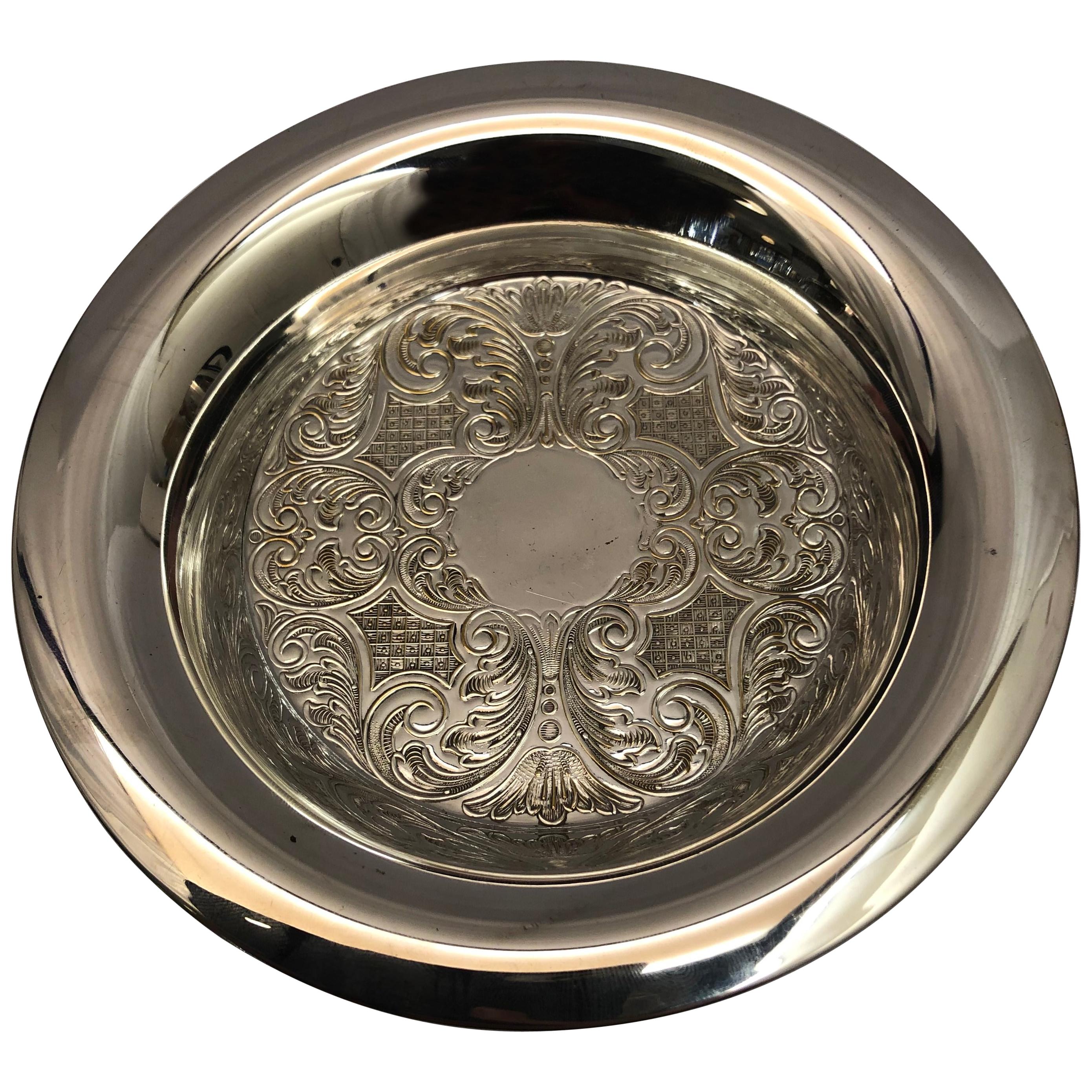 Silver Plate Circular Dish with Embossed Decoration & a Broad Rim For Sale