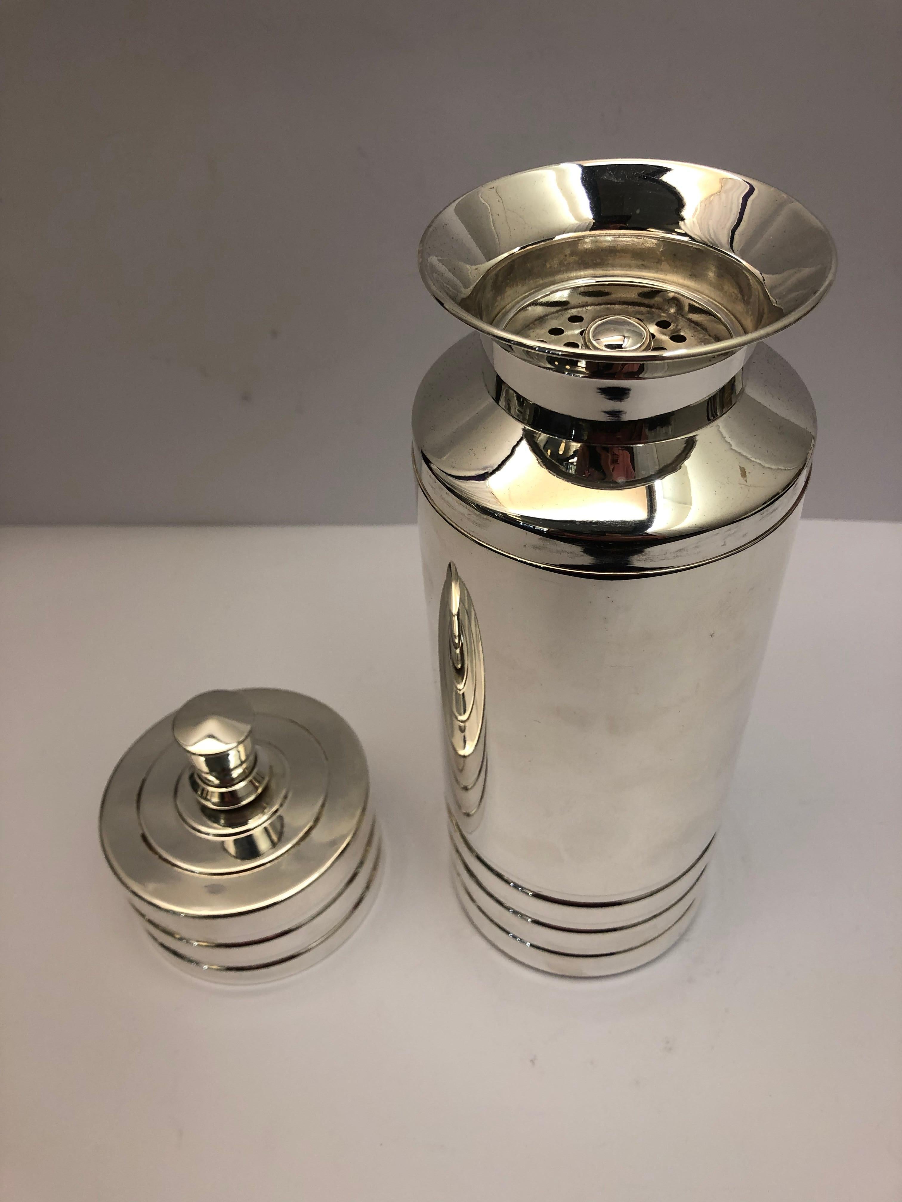 Silver plate cocktail shaker, England, circa 1930s.