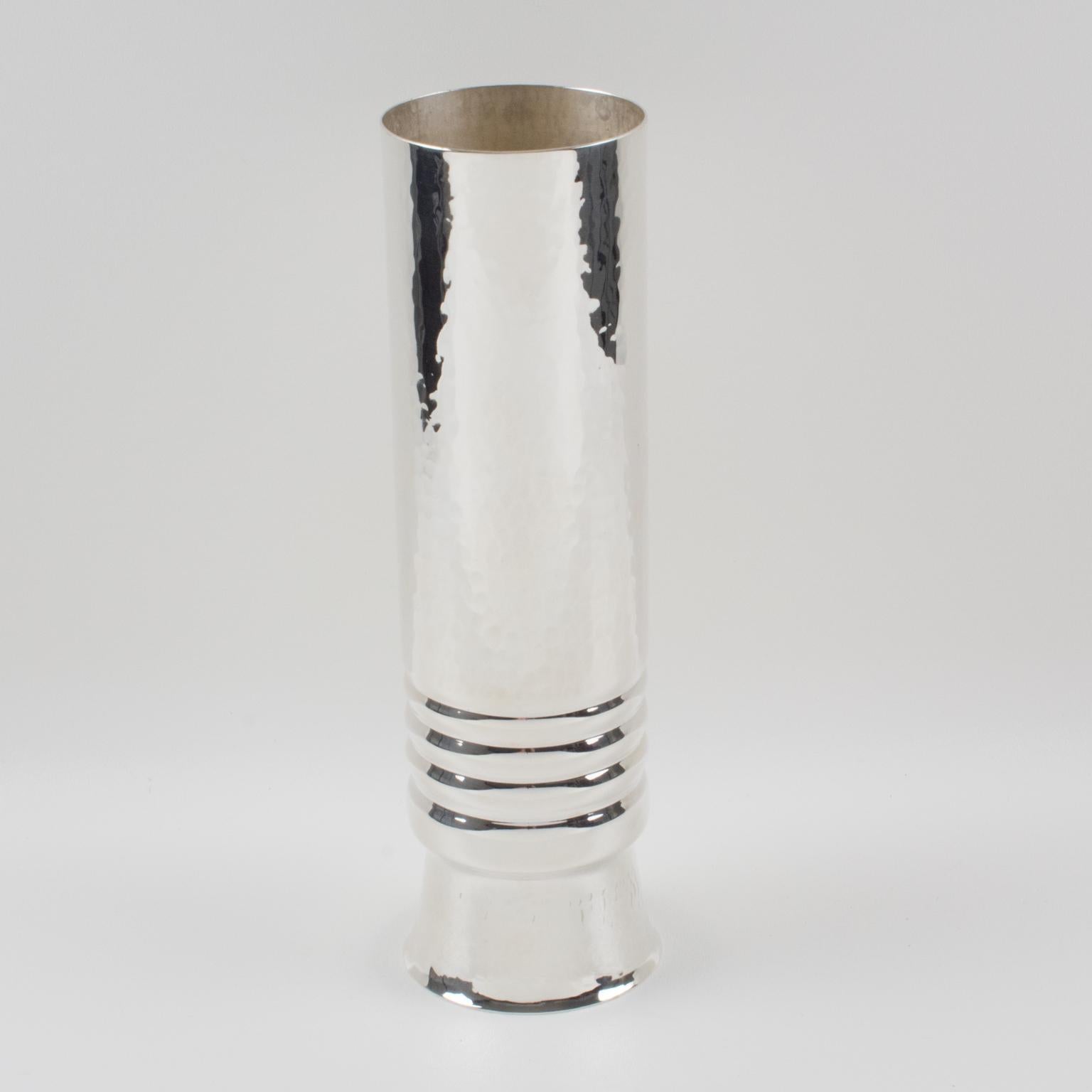 A lovely tall silver plate vase crafted by the Italian silversmith designer B.F. The design features a streamlined tumbler geometric shape with a light embossed hammered pattern. The hallmark on the underside reads 