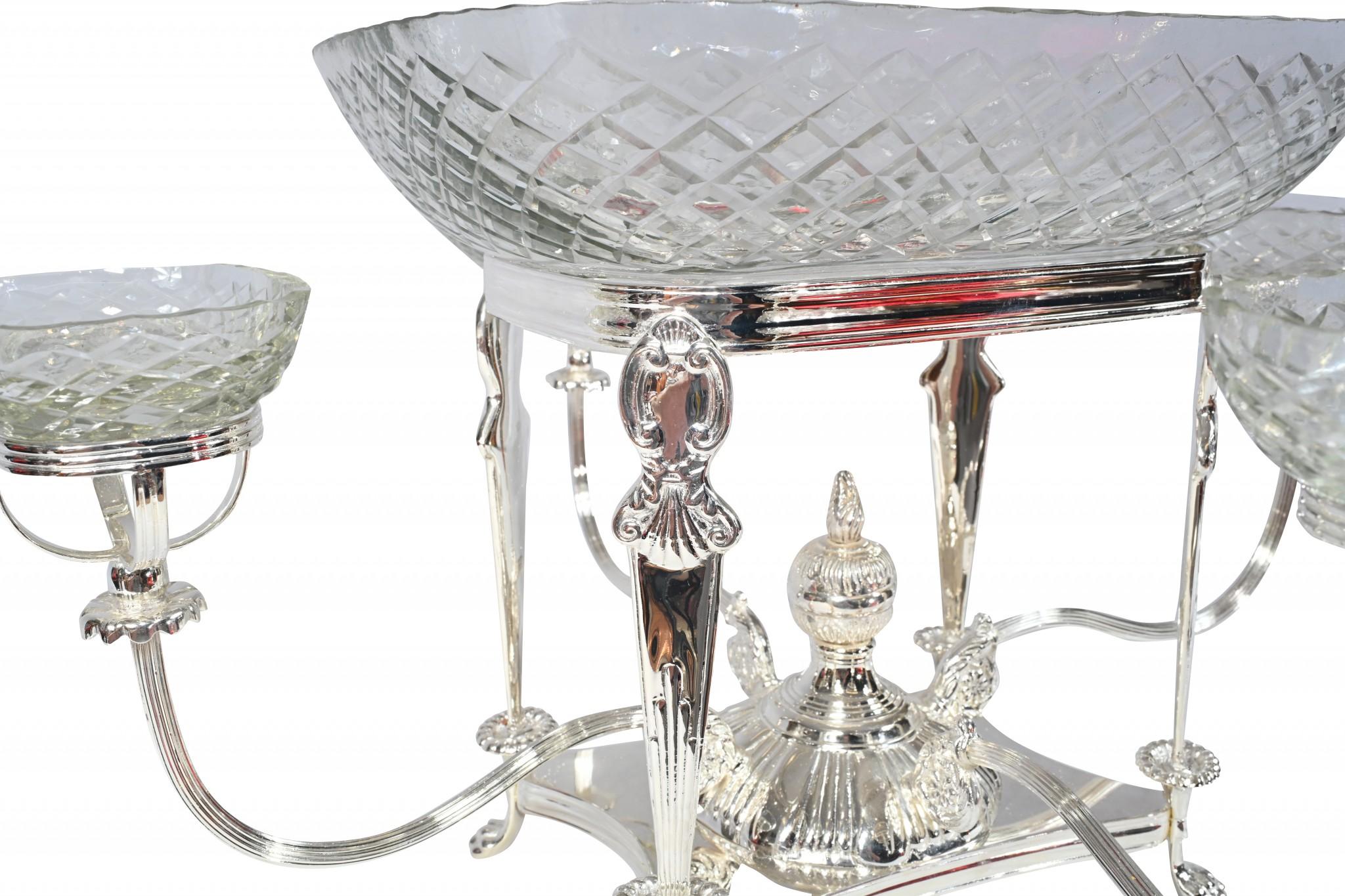 Gorgeous pair of silver plate centrepieces.
Great patina to the silverplate complemented by the crystal glass serving bowls
Elegant decorative pair which would really elevate your dinner service
Show as they are serving fruits, nuts and