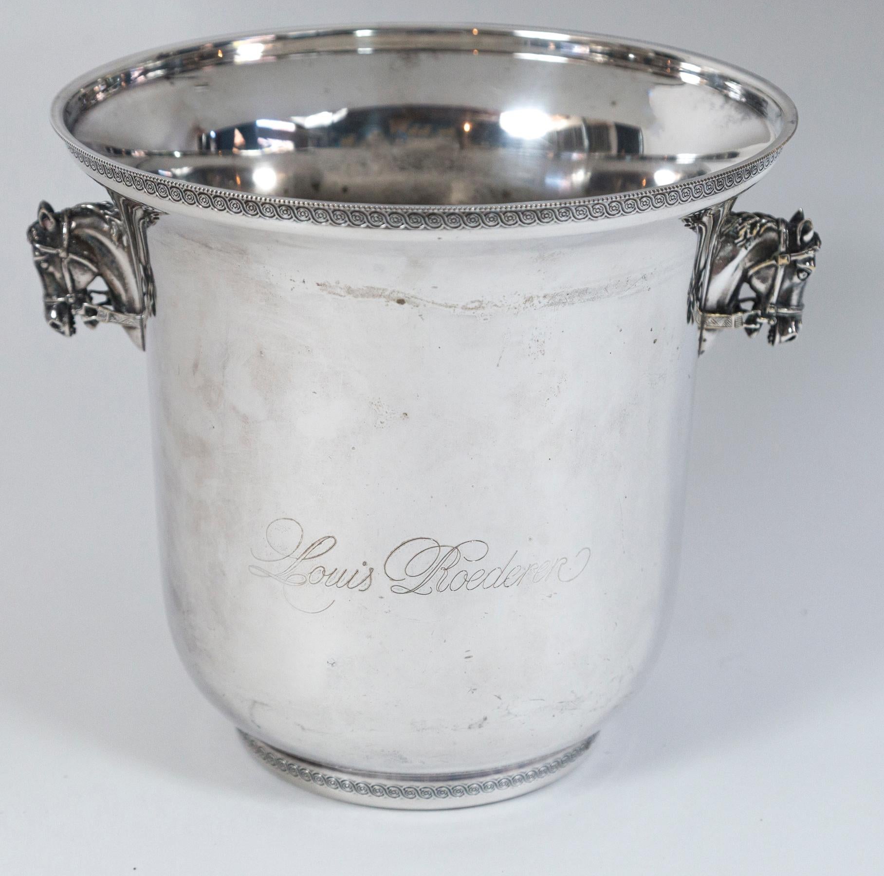Silver plate Louis Roederer champagne bucket, France, circa 1920. Beautifully detailed horse head handles. Manufacturers mark on bottom, Produx S.A., Paris. Provenance: Estate of Janine Metz, social secretary to the Duchess of Windsor in Paris