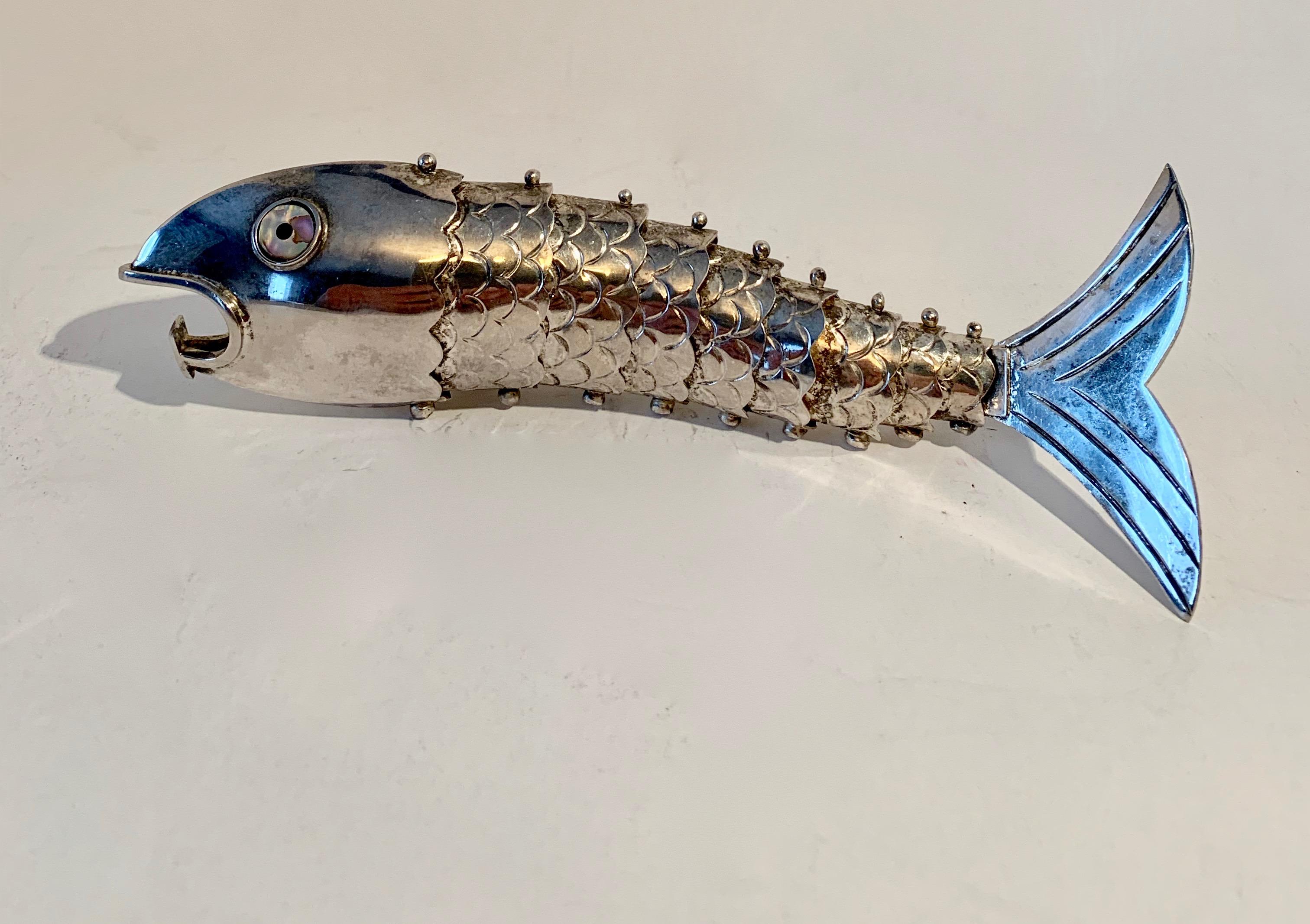 Silver plate Mexican Articulated fish bottle opener in the manner of Los Castillo - a wonderful bottle opener - from Mexico, we have seen these many times in Abalone, but this is a lovely silver plate version. For the bar with hutspa - this will